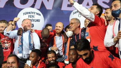 Bilal Erdogan, son of Turkish President Recep Tayyip Erdogan and Basaksehir's players celebrate winning the Turkish Super League Championship. EPA