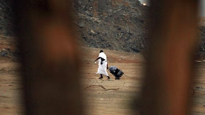 A Muslim pilgrim heads to Mount Arafat near Mecca. Amr Abdallah Dalsh / Reuters