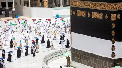 Pilgrims circle around the Kaaba at the Masjidil Haram, Islam's holiest site, during the Tawaf Al Qudum (Tawaf of Arrival) on the first day of Hajj 2020. EPA