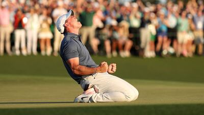 Rory McIlroy celebrates after sinking his winning putt to beat Justin Rose in a play-off for the 2025 Masters. Getty Images