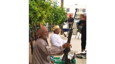 There is a market in the city of Salalah selling rifles and knives.