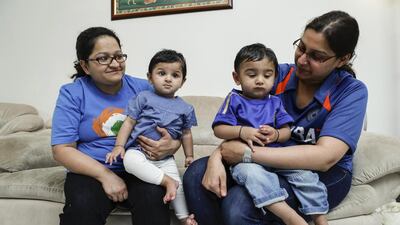 Radha Javeri, left, and her nine-month-old daughter Krisha, along with Neha Javeri and her one-year-old son Maahir will be among the fans who will be at Abu Dhabi’s Zayed Cricket Stadium on Friday where they will see Chennai Super Kings take on Kings XI Punjab and Sunrisers Hyderabad play the Rajasthan Royals. Antonie Robertson / The National