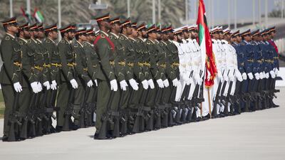 The Armed Forces Honour Guard participates in a Commemoration Day ceremony near the Sheikh Zayed Grand Mosque. Razan Alzayani for Crown Prince Court