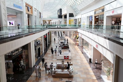 Dubai Festival City Mall makes for a calm local walk with wide corridors and a slightly darker atmosphere. Pawan Singh / The National