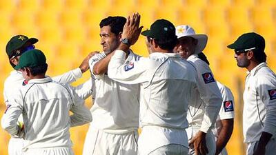Pakistan’s bowling, led by paceman Umar Gul, centre, was exemplary throughout the game at the Zayed Cricket Stadium.