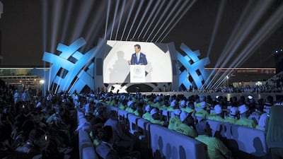 Timothy Shriver, chairman of the Special Olympics (seen on screen), delivers a speech to the crowd. Ryan Carter / the Crown Prince Court