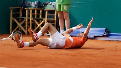 Novak Djokovic takes a tumble. EPA