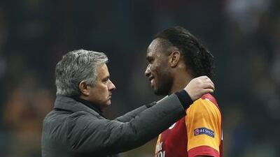 Jose Mourinho, left, and Didier Drogba showed their mutual admiration was across club loyalties when the coach, then at Real Madrid, came up against the Galatasaray striker in last year’s quarter-final. Tolga Bozoglu / EPA / April 9, 2013