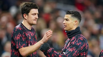 Cristiano Ronaldo, right, has left Manchester United while Harry Maguire has found himself out of their first-choice XI this season. AP