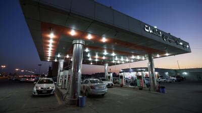 Cars line up at a petrol station after the increase of petrol prices in Khobar, Saudi Arabia. Reuters