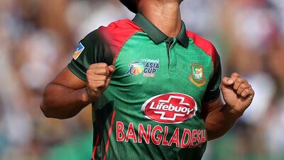 Bangladesh's Abu Hider takes the wicket of Afghanistan's Ihsanullah Janat during the game between Bangladesh and Afghanistan.