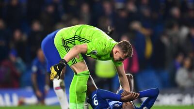 Bernd Leno of Arsenal checks on Tammy Abraham after his injury. Getty
