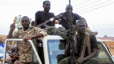Sudanese army soldiers take part in a military parade in the capital Khartoum in August 2025. AFP