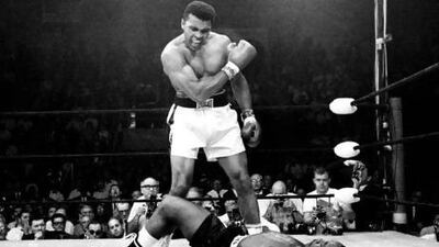Muhammad Ali stands over the fallen Sonny Liston in 1964, in the fight that made him heavyweight champion of the world for the first time. AP Photo / John Rooney