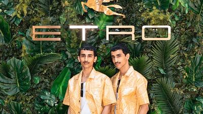 The Emirati Hadban twins, Mohammed and Humaid, attend the Etro spring/summer 2023 menswear show in Milan, wearing matching yellow paisley shirts over knee-length shorts. All photos: Etro
