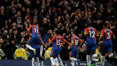 Crystal Palace's Luka Milivojevic celebrates scoring the fourth goal and making the score 3-1 during their match against Manchester City on Saturday. EPA