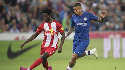Kenedy looks to win the ball for Chelsea. Getty