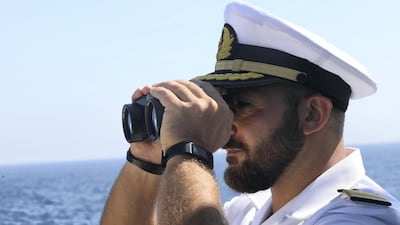 Assessing the weather onboard the Orient Queen II.