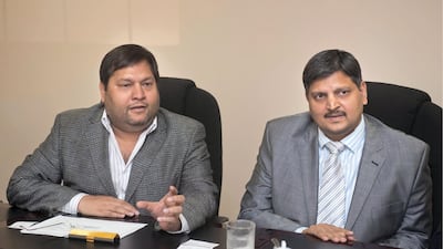 Indian businessmen, Ajay Gupta and younger brother Atul Gupta in Johannesburg, South Africa in 2011. The two men, along with their brother Rajesh, are wanted for charges of corruption in South Africa. Getty