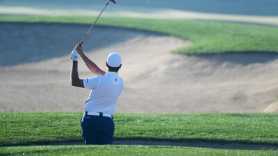 Sam Brazel of Australia plays his second shot on the third hole. Ross Kinnaird / Getty Images