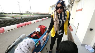 Hajar Rabie, 20, and her all-female team from the Petroleum Institute compete in today’s race at Al Forsan in a hybrid car. Fatima Al Marzooqi / The National