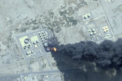 This satellite image shows a fire at a fuel tank farm after a drone attack outside Port Sudan on Tuesday. AP / Planet Labs PBC