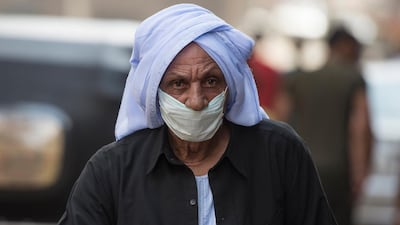 A man walks through the Zebaalin neighbourhood in Cairo, Egypt. EPA