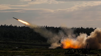 A 30-barrel 220mm multiple rocket launcher system mounted on a T-72 tank Buratino is seen in a dynamic exposition at the International Military Technical Forum 'Army 2018' in Alabino, in the Moscow region. EPA