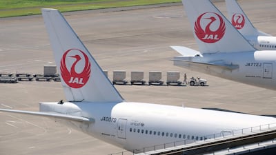 Japan Airlines planes at at Tokyo's Haneda airport. Carrier is forming a joint venture with China Eastern. AFP