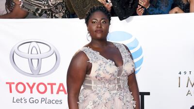 Orange is the New Black star Danielle Brooks wore an ethereal blush pink design by Project Runway alum Michael Costello. AP / Richard Shotwell