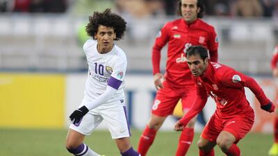 Al Ain's Omar Abdulrahman, left, pictured during an Asian Champions League against Iran's Tractor Sazi at Yadegar Emam Stadium in Tabriz on April 1, 2014, is reportedly on the radar of several European clubs. AFP