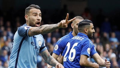 Manchester City's Nicolas Otamendi protests an apparent goal by Leicester City's Riyad Mahrez (26) that was later overturned because Mahrez hit the ball twice. City won 2-1. Martin Rickett / Press Association