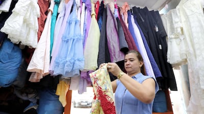 Maricel Santos at Jamal Kamal thrift shop on Hamdan Street, Abu Dhabi. Photo: Chris Whiteoak / The National