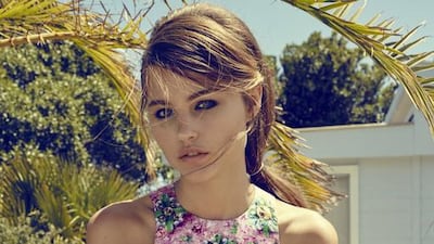 RISE AND SHINE: Dress, Mary Katrantzou. Stockings, Christian Dior.