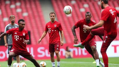 Mario Gotze, centre, training with his Bayern Munich teammates. The Germany international may be on his way back to Borussia Dortmund. Wu Hong / EPA