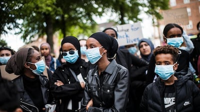 People attend a Black Lives Matter Denmark rally in Odense, Denmark. AP