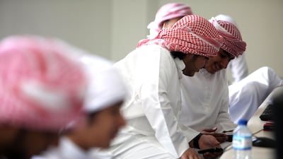 Students attend the first day of college at the men's campus of UAE University in Al Ain. Sammy Dallal / The National