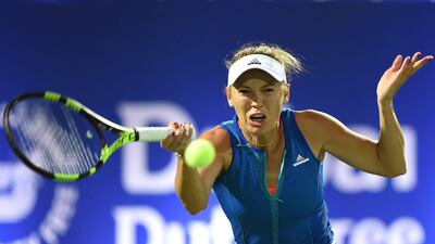 Caroline Wozniacki, who won the Dubai Duty Free Tennis Championships six years ago, reached the second round on Monday. Tom Dulat / Getty Images