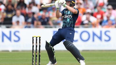 Jos Buttler of England hits the ball. Getty Images