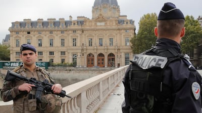 French police secure the area in front of the Paris Police headquarters. Reuters