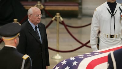 Gorbachev pauses in front of Reagan's casket during his funeral in the Capitol Rotunda in Washington, June 10, 2004. EPA
