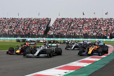 Red Bul's Max Verstappen, left, alongside Lewis Hamilton's Mercedes during Sunday's Mexican Grand Prix. Getty