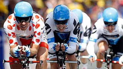 Garmin rider Thor Hushovd, left, leads his teammates during the team time trial on the second stage of the Tour yesterday.