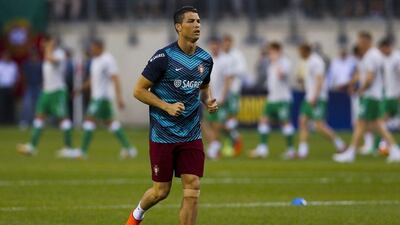Portugal's Cristiano Ronaldo warms up before Tuesday night's international friendly against Ireland as the Portuguese prepare for the 2014 World Cup in Brazil. Jose Sena Goulao / EPA / June 10, 2014