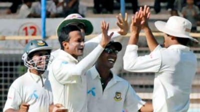 Bangladesh's cricketers celebrate the dismissal of New Zealand's Brendon McCullum, as they reduce the Kiwis to 155 for nine.