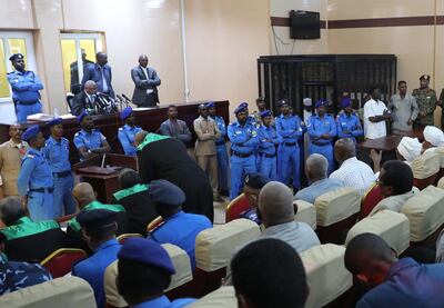 Presiding judge Al Sadeq Abdul Rahman reads the verdict against Sudan's ousted president Omar Al Bashir during his trial in Khartoum. EPA