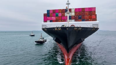 A cargo ship sails into port in Qingdao, China. The proposed global pricing system aims to help curb greenhouse gases. AFP