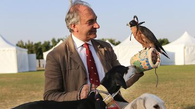 Prince Alduino di Ventimiglia di Monteforte, a descendant of a Holy Roman Emperor, with his falcon and Saluki dogs at a Falconry Festival and Conference in Abu Dhabi. Ravindranath K / The National