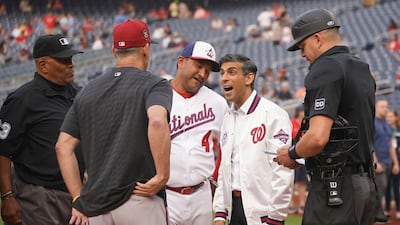 Washington Nationals Manager, David Martinez introduces British Prime Minister Rishi Sunak to umpires. AP
