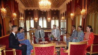 Inside the royal residence, the Duke and Duchess of Ca,bridge sit down with Moulay Hassan, Crown Prince of Morocco, Princess Lalla Meryem of Morocco, Princess Lalla Hasna of Morocco and King Mohammed VI of Morocco. Getty Images